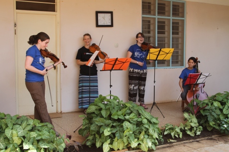 Part of C4C's New String Program = String Teachers Performing at the Orphanage